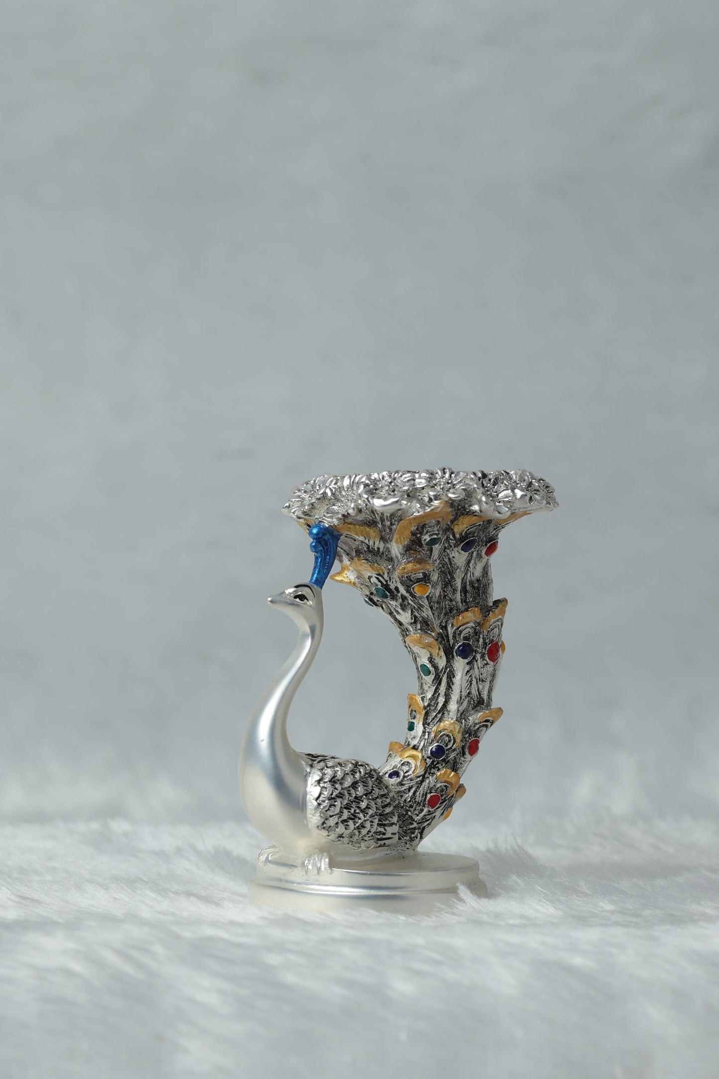 Silver Plated Antique Matt Finish Peacock Candle Holder measures 4*2.5*2.5 inches and weighs 180 grams. Perfect For table top and home decor Dropshiping
