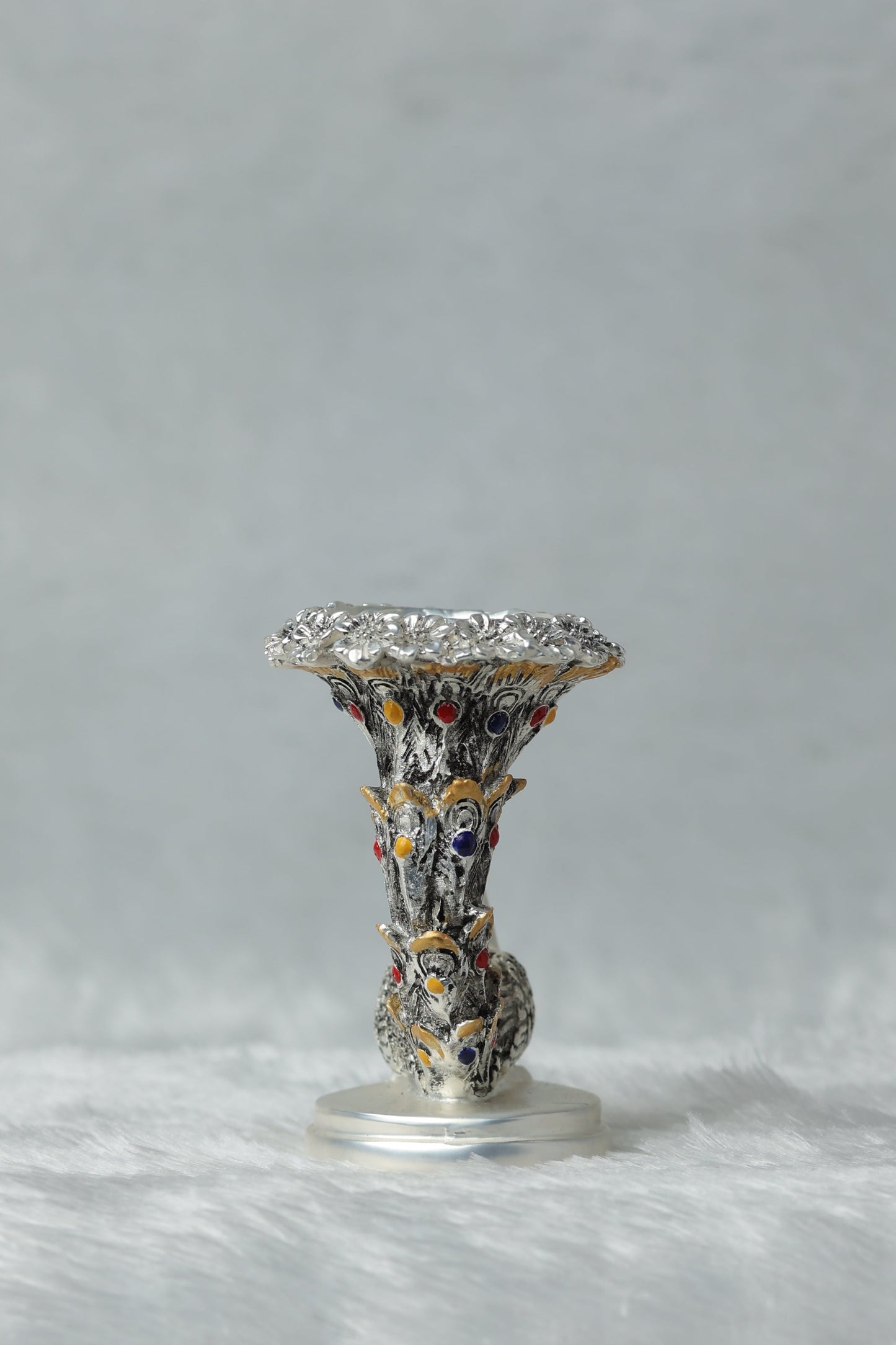 Silver Plated Antique Matt Finish Peacock Candle Holder measures 4*2.5*2.5 inches and weighs 180 grams. Perfect For table top and home decor Dropshiping